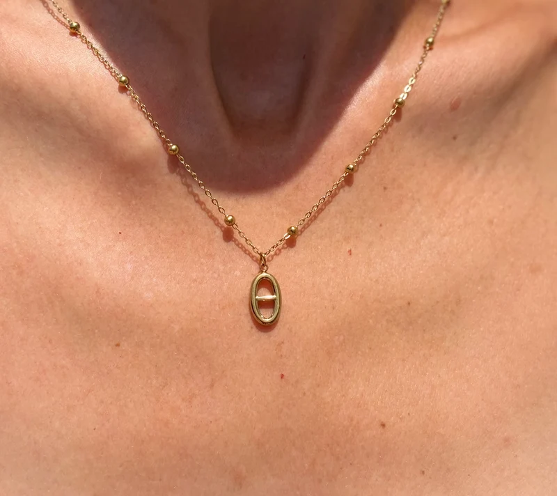 Collier sautoir dos